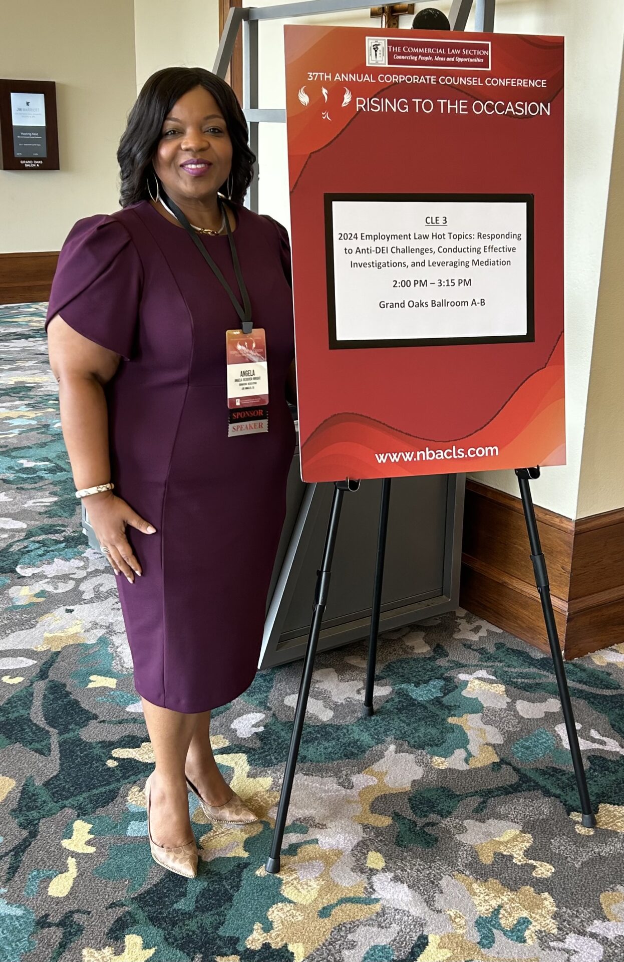Angela Reddock-Wright smiling at the National Bar Association Commercial Law Section Corporate Counsel Conference in San Antonio, Texas where she discussed the developing laws around the use of Artificial Intelligence (AI) in the workplace, including the EEOC’s recent guidance to employers and employees on this topic. These issues are exemplified by the recent CVS discrimination lawsuit.
